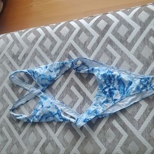 New, in original package, never worn, one piece cut-out swimsuit, size L